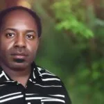 Ernest Pugiye Guru SMAN 1 Dogiyai